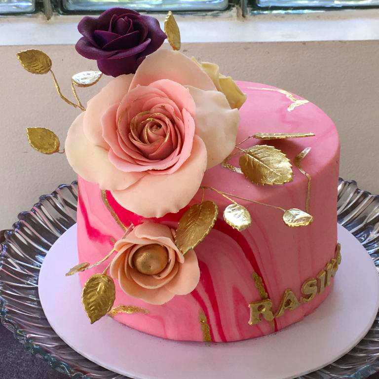 Fondant icing cake with pink rose
